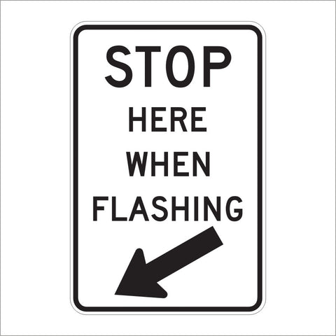 R8-10 STOP HERE WHEN FLASHING WITH ARROW SIGN