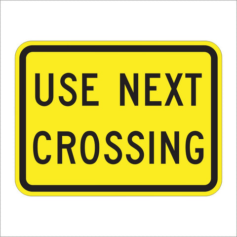 W10-14AP USE NEXT CROSSING SIGN